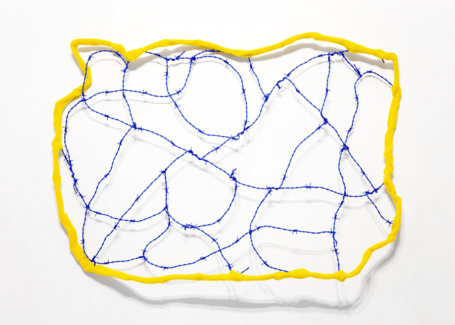 A cloud object made of barbed wire and fabric in blue and yellow color
